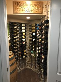 a wine cellar filled with lots of bottles