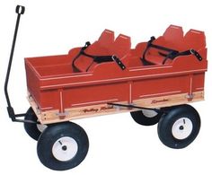 a red wagon with two seats and wheels