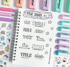 a notebook with some writing on it next to markers and pencils that say little dogs