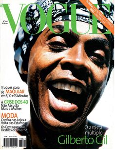 a magazine cover with a smiling man wearing a turban on top of it