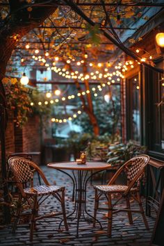 Cozy outdoor cafe seating with wicker chairs and candlelit table, surrounded by string lights and autumn leaves. Apartment Aesthetic Balcony, Aesthetic Balcony, Space Saving Apartment, Ideas For Apartments, Tiny Balcony, Maximize Small Space, Farmhouse Living Room Furniture, Modern Farmhouse Living