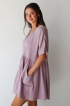 An instant outfit starts with your favorite shoes and the Cute On Cue Lilac Linen Babydoll Mini Dress! This dress is designed to bring a touch of whimsy and sophistication to your wardrobe, perfect for a variety of occasions. Crafted from soft, breathable linen, this mini dress features a soothing lilac hue that adds a fresh, feminine touch. The babydoll silhouette offers a relaxed fit with a gently flared skirt that falls gracefully above the knees, creating a flattering and carefree look. Pair Babydoll Dresses, Babydoll Mini Dress, Lilac Dress, Lilac Color, Flared Skirt, Babydoll Dress, Shorts With Pockets, Flare Skirt, Above The Knee