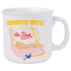 a coffee mug with the words biscuits with the box on it