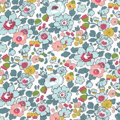 an image of a flowery fabric with blue, pink and yellow flowers on it