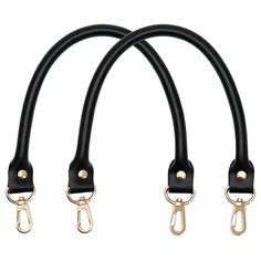 three black leather leashes with gold hardware on each end and two metal hooks attached to them