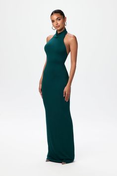 Elevate your look in our bodycon maxi dress. Designed with a halter neckline, open upper-back and a body hugging finish. Style with heels or flats for day or night plans. NW Collection Import 95% Viscose, 5% Spandex Model wears size X-Small True to size Double-lined Black Halter Maxi Dress, Maxi Halter Dress, Modest Maxi Dress, Bodycon Maxi Dress, Halter Neck Dress, Naked Wardrobe, Halter Maxi Dress, Vacation Wear, Pattern Sewing