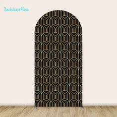 an art deco door is shown in black and gold