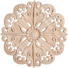 an intricately carved wooden design on a white background