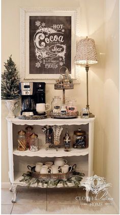 a coffee bar is decorated for christmas with chalkboard sign above it and other items on the shelf