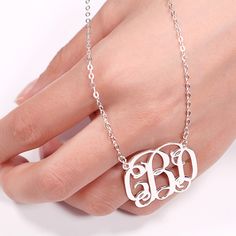 Jeulia classic sterling silver monogram necklace, this monogram necklace support three letters customized design for you chain with sterling silver, classic design and an exquisite design, makes your letter necklace become a beautiful and unique necklace. You can engrave your friends name or ‘Mom/Dad’ as a necklace gift in some special days. To express your love or friendship, never to be late to get your initial necklace with customized letter design online.Chain Type: Width: 30 mmHeight: 30 mm Stainless Steel Initials Name Necklace, Monogram Initial Pendant Name Necklace, White Gold Initial Necklace For Anniversary, Elegant Stainless Steel Name Necklace As Personalized Gift, Elegant Stainless Steel Name Necklace For Personalized Gift, Elegant Stainless Steel Custom Name Necklace, Elegant Personalized Stainless Steel Name Necklace, Personalized Elegant Stainless Steel Name Necklace, Classic Personalized Stainless Steel Necklaces