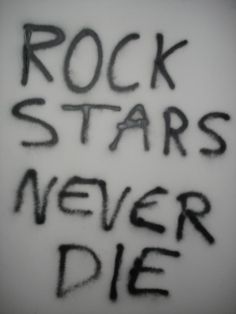 the words rock stars never die written in black ink on a white background with some type of writing