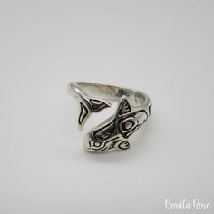 "Woman's Sterling silver Northwest Native ring with Orca Whale wrapped band. 925 silver. Measures approx. 13mm width from top fin to mouth (approx. 1/2\") Made in Mount Vernon, WA USA. Thanks for visiting!" Nature-inspired Sterling Silver Jewelry With Polished Finish, Symbolic Sterling Silver Rings With Polished Finish, Symbolic Engraved Open Ring Jewelry, Artisan Sterling Silver Ring With Etched Details, Artisan Sterling Silver Etched Rings, Artisan Sterling Silver Ring With Polished Finish, Nickel-free Open Band White Gold Jewelry, Untreated White Gold Ring Jewelry, Stamped 925 Symbolic Ring Jewelry