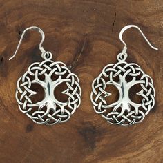 Celtic Tree of Life Drop Earrings in High Polish Sterling Silver. This design ties together ancient Celtic knot work and Tree of life symbology. * A high quality, unique product * Sold as PAIR * Ethically traded sterling silver * Pair Weight 6gr * Gift boxed with explanation card * Ships direct from Edinburgh, Scotland * Supports a small artisan business The ancient Celts viewed life as an eternal journey, believing in continual reincarnation until spiritual fulfilment was achieved. Elaborate in Celtic Knot Work, Ancient Celts, Tree Of Life Earrings, Celtic Tree Of Life, Celtic Tree, Silver Tree, Edinburgh Scotland, Celtic Knot, Tree Of Life