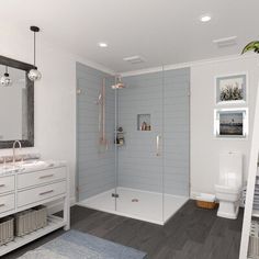 a bathroom with gray walls and white fixtures