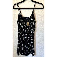 American Eagle Outfitters Dress Size Xs Black White Floral Vneck Peep Hole Nwt I Put Measurements In Photos-All Of The Measurements Are Approximate. Thank You For Shopping The Teacher Treasure Chest! Casual Black Dress With Surplice Neckline, Black V-neck Dress With Surplice Neckline For Spring, Black Mini V-neck Dress For Vacation, Black Summer V-neck Dress For A Day Out, Casual Black V-neck Dress For Spring, Black V-neck Summer Dress For Day Out, Black V-neck Surplice Dress For Spring, Black V-neck Dress For Summer Day Out, Black V-neck Dress For Spring Beach Occasions