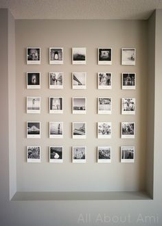 a wall that has many pictures on it