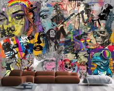 a living room filled with lots of colorful graffiti art on the wall above a couch