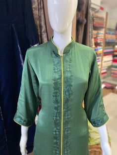 A stunningly marvellous outfit featuring Kashmiri Aari embroidery. - - - - - - - - - - - - - - - - - - - - Product Details- Condition: Brand New (made to order)– Handmade– Style: Indian Ethnic Suit– Embroidery: Kashmiri Aari Work with Silk Thread- Colour: Bottle & Lime Green– Care Instructions: Dry Clean OnlyF A B R I CShirt: ChinonDupatta: ChinonLower: Indian CrepeF I N I S HUnstitched/Semi-StitchedYou can get it stitched locally.47+ inches of Shirt Length and up to full sleeves length.Stitched Raw Silk Lawn Suit With Intricate Embroidery For Festivals, Festival Raw Silk Lawn Suit With Intricate Embroidery, Semi-stitched Pista Green Churidar With Embroidered Border, Festive Raw Silk Lawn Suit With Intricate Embroidery, Fitted Green Chinon Sets, Semi-stitched Embroidered Green Kurta, Embroidered Chinon Lawn Suit With Straight Kurta, Traditional Raw Silk Lawn Suit For Eid, Fitted Anarkali Salwar Kameez With Intricate Embroidery