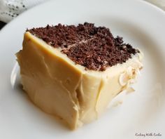 a piece of cake sitting on top of a white plate