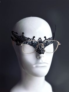 Crafted with meticulous precision and designed for ultimate comfort, this black lace mask allows you to keep your glasses on while indulging in the thrill of the masquerade. Perfect for formal events, costume parties, or any occasion where you want to make a dramatic entrance.


Age Group/Gender - Adult/Men

Size/Type - One size fits all adults

Mask Color - Black

Mask Material - Lace Lace Mask Masquerade Men, Mens Masquerade Mask Black, Gothic Eye Mask For Theater, Gothic Eye Mask For Theater Masquerade, Gothic Adjustable Masquerade Mask, Gothic Eye Mask For Masquerade, Black Lace Mask, Masquerade Mask Black, Black Masquerade