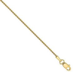 The necklace is created by cobbling up strands of links made out of 14K yellow gold. Yellow