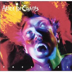 an image of a woman with her mouth open and the words alice in chains painted on it