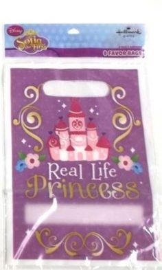 a purple bag with a princess castle on it's front and the words real life princess