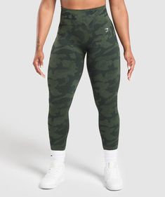 FEEL GOOD, PERFORM BETTER Whether it’s a bicep-poppin’ upper day or a big glute sesh, Adapt’s here to help you look damn good while you put in the work. • Sweat-wicking tech keeps you cool • Seamless ribbed waistband and ankle cuffs• All over camo jacquard SIZE & FIT• High waisted fit• Model is 5'3" and wears size S MATERIALS & CARE• Seamless construction for zero distraction lifting • 78% Nylon, 15% Polyester, 7% Elastane SKU: B5A8B-ECY9 Green Force, Gifts For Gym Lovers, Gym Jacket, Put In The Work, Gymshark Leggings, Camo Leggings, Workout Sets, Sport Dress, Sweater Tank Top