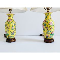 Vintage Asian style hanpainted petite table lamp with floral motif. Yellow represents the earth in traditional Chinese culture, it is also an imperial color that represents prosperity. The assortment of pink and blue flowers adds more meaning to this very sweet pair of lamps. They sit on a traditional Chinese wooden base. There is a switch on the socket and the wire. They are perfect for a small space or nightstands. The lamps are 4" 1/2 W by themselves, with shades they are 12" W. Atomic Table, Pink Table Lamp, Petite Table, Pink Table, Pink And Blue Flowers, Painted Table, Vintage Table Lamp, Blue Ceramics, Chinese Culture