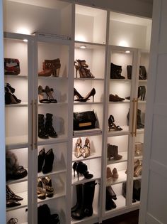 a closet filled with lots of different types of shoes