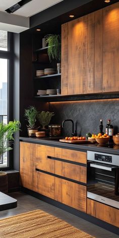 a kitchen with wooden cabinets and black counter tops, potted plants on the window sill