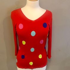 Super cute red lightweight pullover sweater, which I believe to be a silk blend, features large colourful polka dots on its front and a flattering V neck. Maker tag has been removed, but has a Talbot's vibe! In good to excellent condition; some minor pilling at front and a tiny pull, please see last two photos.  Measurements:  Shoulder to shoulder, laid flat, 16 inches Underarm to underarm, laid flat, 17 inches Length 25 inches Fun Red Tops For Fall, Playful Long Sleeve Red Sweater, Playful Fitted Winter Sweater, Playful Fitted Sweater For Winter, Fitted Red V-neck Sweater, Red Retro Sweater For Spring, Retro Red Sweater For Spring, Red Fitted Long Sleeve Sweater, Playful Fitted Red Tops