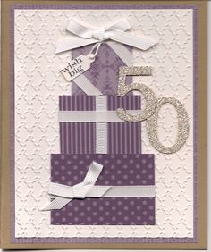 a purple and white card with the number fifty five on it's top tier