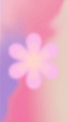 a blurry image of a flower on a cell phone