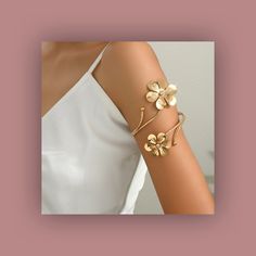 🔍 PRODUCT SIZE ▪ Diameter:  3.35 inches 📌 PRODUCT FEATURES ▪ Colors: Yellow Gold ▪ Gender: Women, Girl ▪ Material: Iron, Copper ▪ Type: Arm Cuff ▪ Style: Fashionable, Butterfly or Flower shape 🕒 PROCESSING TIMES ▪ Orders ship within 1-3 business days. 🚚 SHIPPING ▪ Includes tracking number. 📞 COMMUNICATION ▪ Please provide your phone number for smooth delivery. 🎁 Thank you for visiting our store! Girlfriend Bracelet, Gold Arm Cuff, Gold Arm Band, Girl Material, Arm Cuffs, Arm Cuff, Unique Gifts For Her, Body Jewellery, Stunning Jewellery