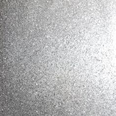 silver glitter textured background with white highlights