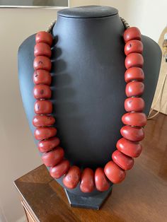 This necklace is made up of traditional beads in a rich and pleasing red and probably comes from North Africa, namely Morocco. There are a lot of these resin beads about which simulate the original copal ones but what distinguishes this set is that being a vintage piece it has good colour and patina nevertheless. It looks great as a statement piece on a black top! Red Vintage, Resin Beads, North Africa, Black Top, Deep Red, Etsy Vintage, Statement Pieces, Morocco, Patina