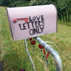 a mailbox with the words love letters only written on it