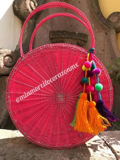 Colourful Mexican round bag with pom poms. The colour is so bright. Hand-woven Made of plastic and light metal. Diameter 30 cms. Note: Color looks brighter in the pic Pink Handwoven Beach Bag For Summer, Handwoven Pink Beach Bag For Summer, Pink Bohemian Straw Tote Bag, Handmade Pink Straw Tote Bag, Pink Basket Beach Bag, Pink Woven Straw Bag For Market, Pink Handwoven Straw Bag For Summer, Bohemian Pink Tote Beach Bag, Pink Handmade Eco-friendly Beach Bag