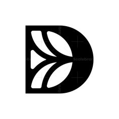 the letter k is made up of black and white letters with leaves on them, which are