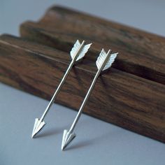 Arrow Earrings. Sterling Silver & Handmade. Choose from a stud back fastening or a hookwire drop. (Studs approx 45mm, Drops about 55mm in length). Matching Bow & Arrow Necklace: https://www.etsy.com/uk/listing/175497581/bow-and-arrow-necklace-cupids-bow-arrow Gift-boxed with care. Cupid Love, Silver Arrow, Arrow Earrings, Bow Arrows, Sterling Silver Stud Earrings, Arrow Design, Rose Jewelry, Silver Stud Earrings, Earrings Long