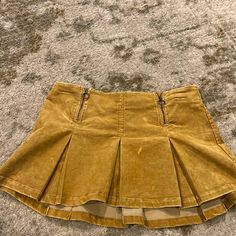 Color: Yellow. Corduroy Material. New With Tags. Size Medium. Yellow Mini Skirt, Preppy Skirt, Plaid Pleated Mini Skirt, Style Moodboard, Quilted Skirt, White Pleated Skirt, Mini Skater Skirt, Urban Outfitters Skirt, Corduroy Material