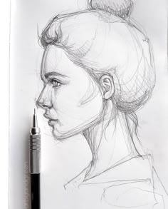 a pencil drawing of a woman's profile