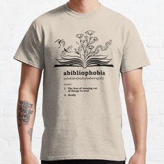 a man wearing a t - shirt with the words abidilophobia printed on it