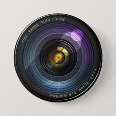 a camera lens mounted on the side of a wall