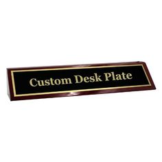 a sign that says custom desk plate