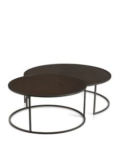 two round tables with metal bases on each side, one is brown and the other is black