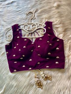 This is a custom stitched velvet blouse.  I make it exclusively for my customers by using high quality velvet fabrics. I will only make it after you confirm your order. Blouse is made using velvet fabric. Navratri Velvet Lehenga, Purple Lehenga With Unstitched Blouse, Velvet Wedding Blouse Piece, Festive Velvet Choli With Mirror Work, Festive Padded Blouse Choli For Party Wear, Festive Velvet Choli For Navratri, Fitted Velvet Lehenga For Festivals, Festive Party Wear Padded Choli, Fitted Cropped Choli