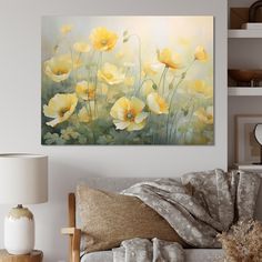 a living room scene with focus on the yellow flowers painted on the wall above the couch