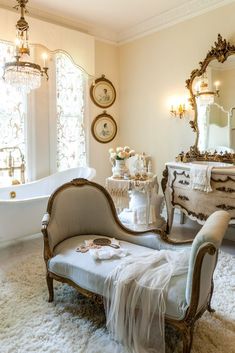 an ornately decorated bathroom is shown in this image, with antique furniture and mirrors on the walls